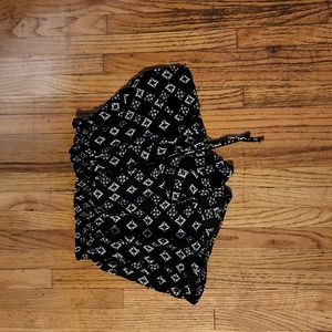 Black and white shorts.